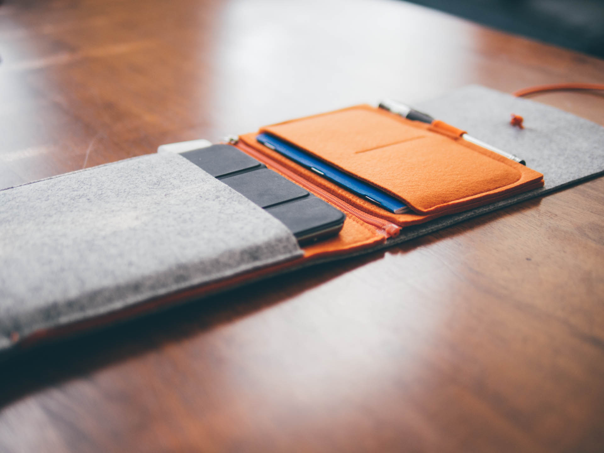 The Felt Case mini is a simple, sleeve-style case for the iPad. It'll fit an iPad mini with or without a Smart cover, and it has a cool (removable) analog pouch that'll fit a Field Notes-sized notebook and a pen or pencil.