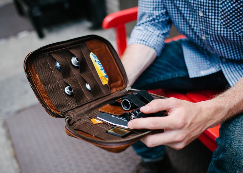 A small, Italian-leather folio designed to hold and protect small photography accessories.