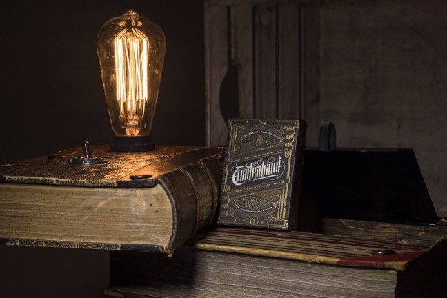 Theory 11's Contraband playing cards ($150 with Book Lamp, $8 for deck alone)