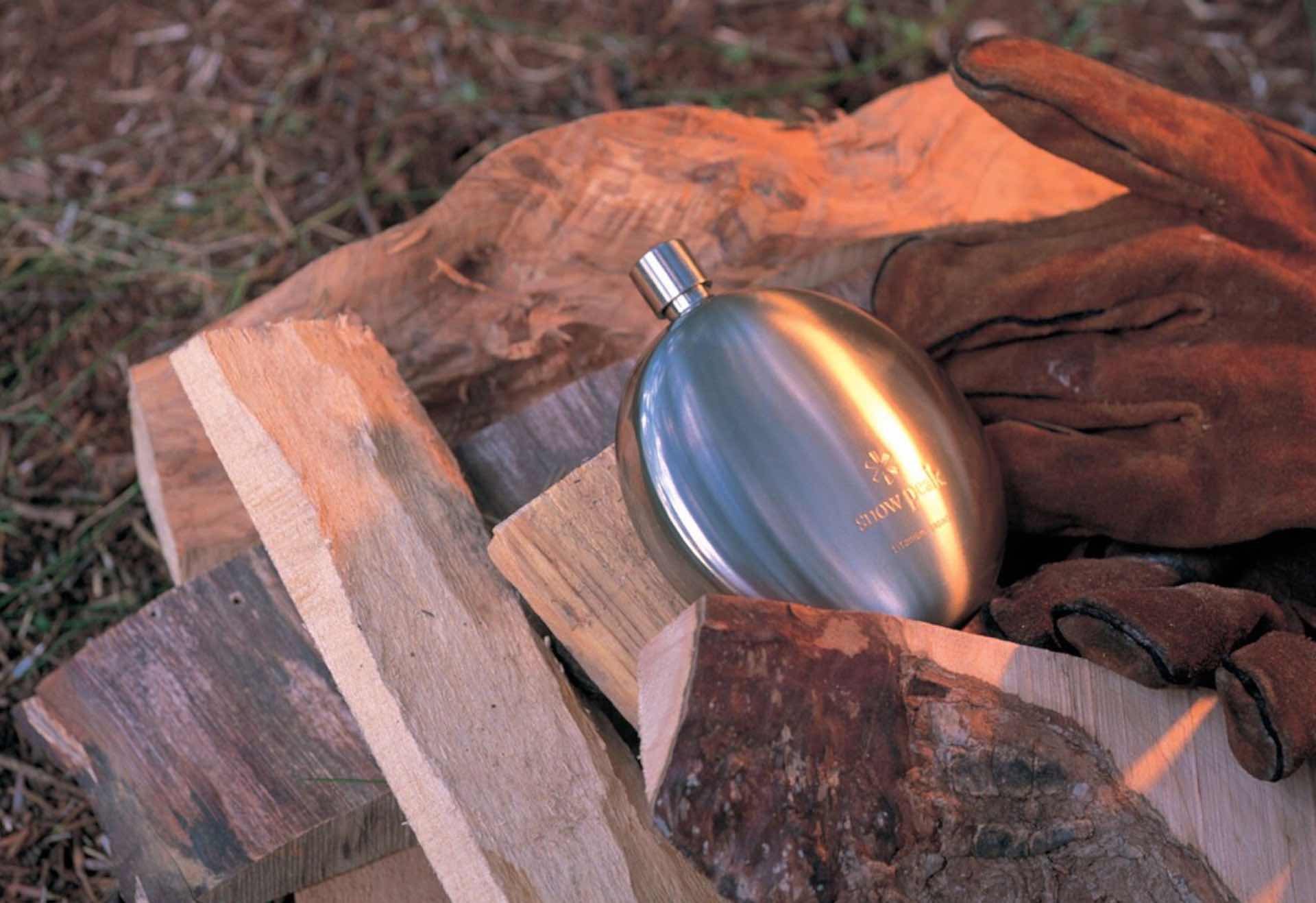 snow-peak-titanium-curved-flask-outdoors