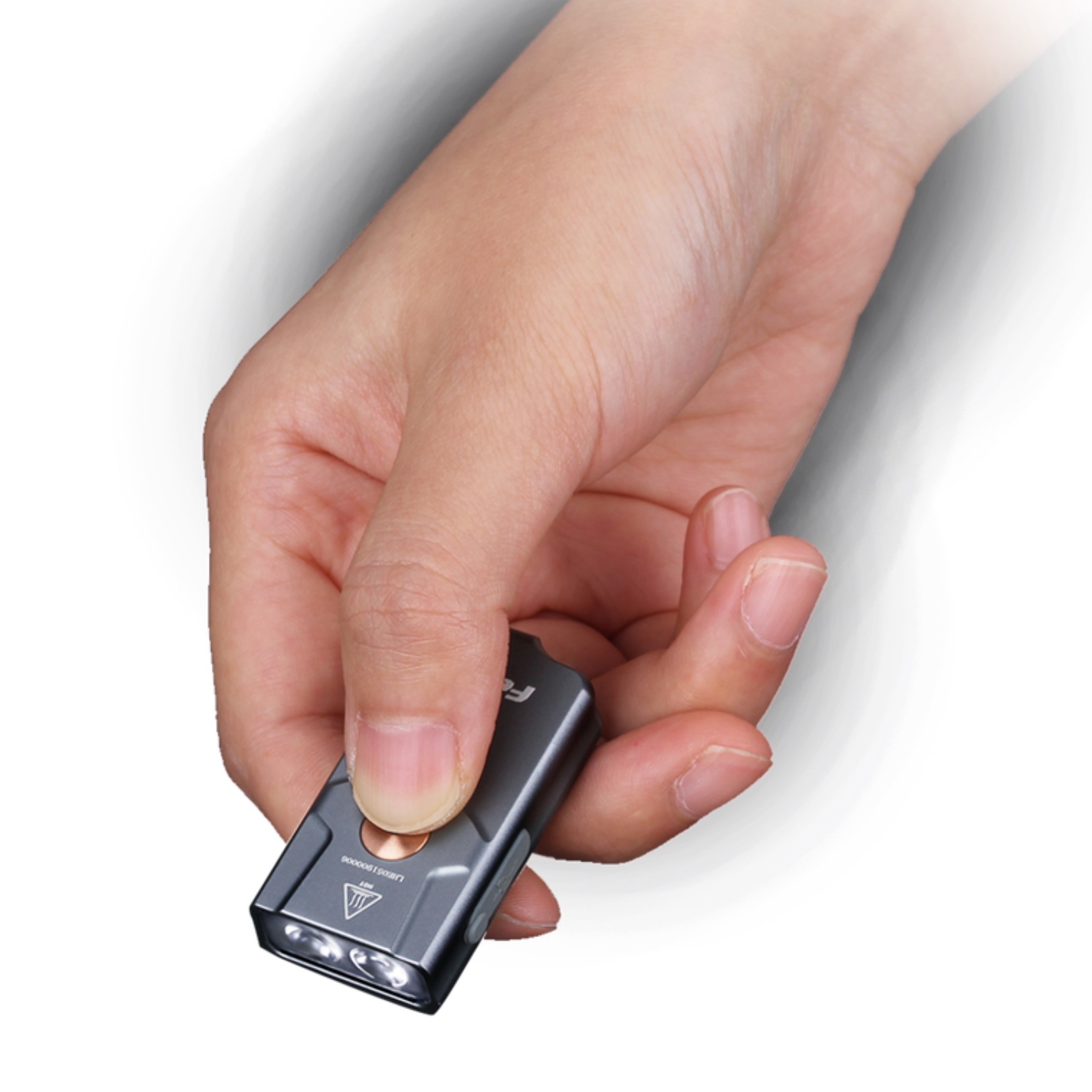 fenix-e03r-rechargeable-keychain-flashlight-in-hand