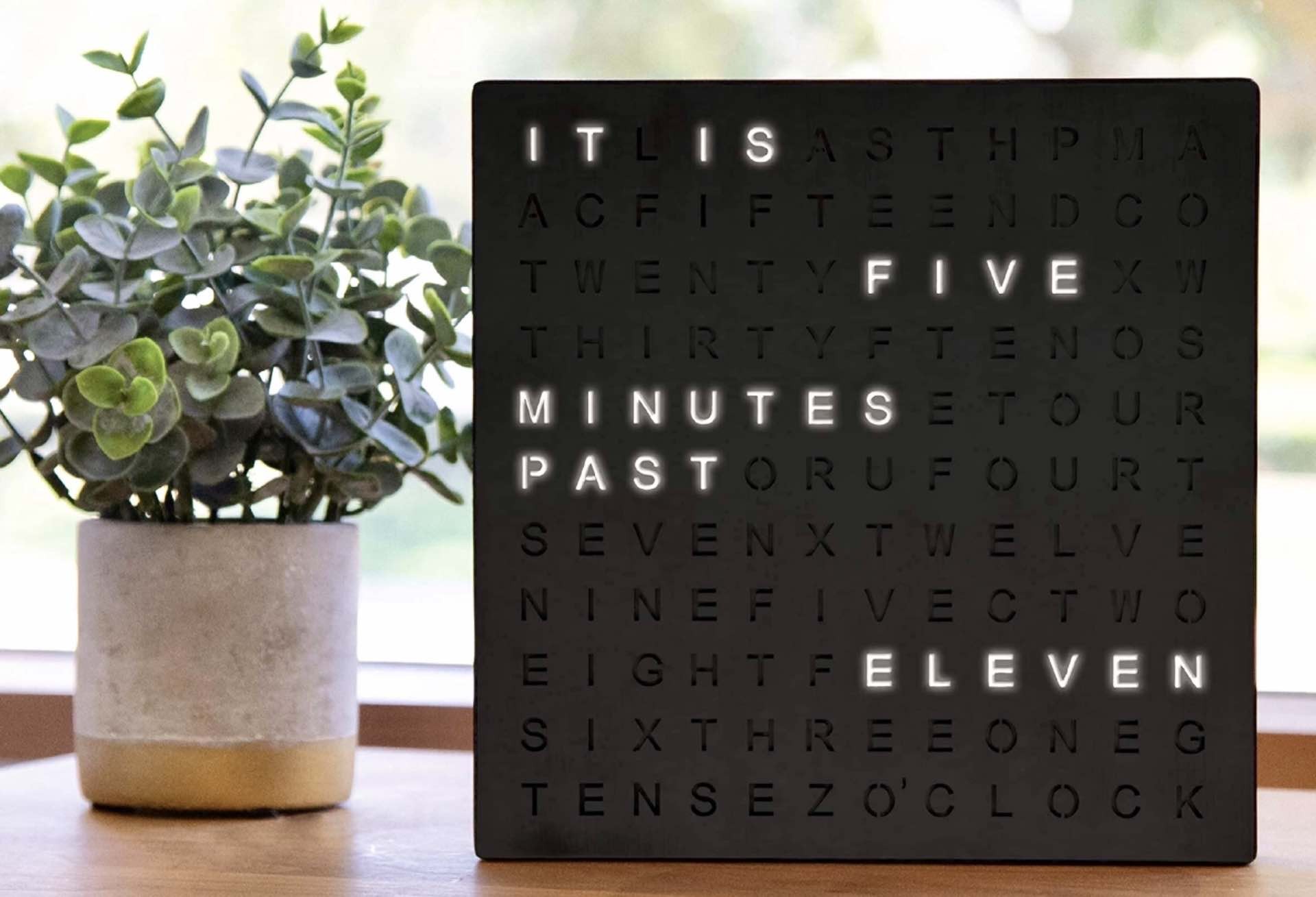 Sharper Image Word Clock. ($27, available in black or copper)